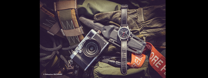 Camera with camouflage gear and T.O.T TIME ON TARGET watch