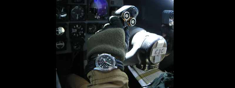 Pilot in a plan cockpit with close up on his T.O.T TIME ON TARGET